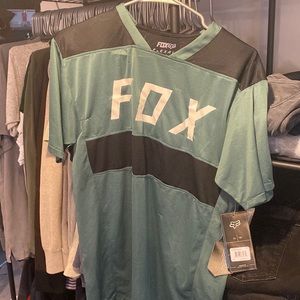 Mens small biking shirt NWT